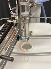 Load image into Gallery viewer, Drum tote pail filling machine filling an IBC tote with laser alignment